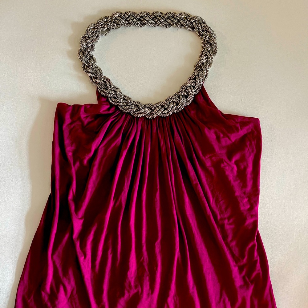 Beautiful party blouse with collar crafted in delicate stones.  Size m